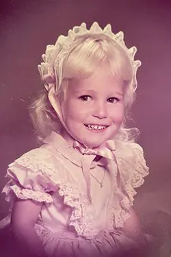 A vintage photograph of a baby girl toddler